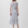 Vestido camisero midi transparente