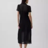 Vestido camisero midi transparente