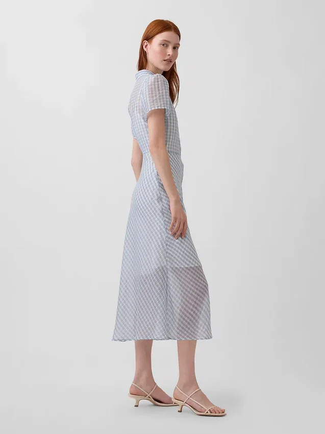 Vestido camisero midi transparente