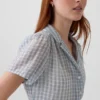 Vestido camisero midi transparente