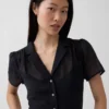 Vestido camisero midi transparente
