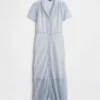 Vestido camisero midi transparente