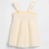 Vestido de bebé con flores de croché