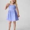 Vestido delantal de materiales mixtos para bebés y niños
