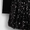 Vestido infantil con volantes y lentejuelas de materiales mixtos