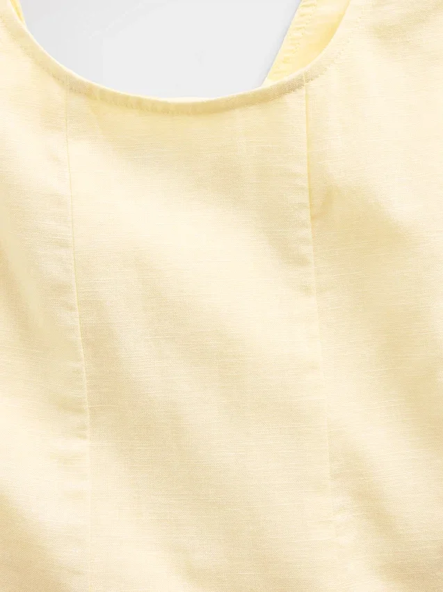 Vestido infantil de lino y algodón con cuello redondo