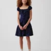 Vestido infantil de lunares con cintura baja