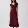 Vestido largo con cuello en V y dobladillo con volantes