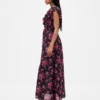 Vestido largo con cuello en V y volantes