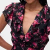 Vestido largo con cuello en V y volantes