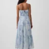 Vestido largo con volantes y lazo en la espalda