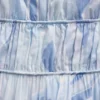 Vestido largo con volantes y lazo en la espalda
