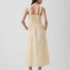 Vestido largo de cintura baja con costuras caladas