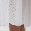 Vestido largo de cintura baja con ojales