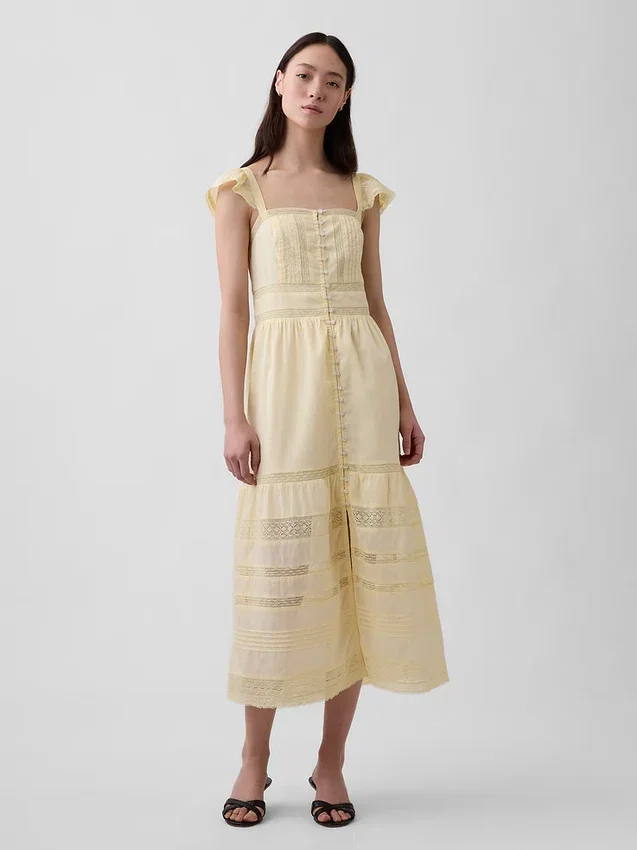 Vestido largo de voile con volantes de encaje
