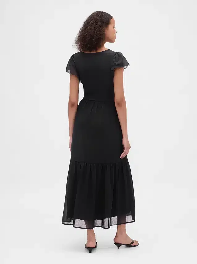 Vestido largo moderno con volantes de mezcla de telas