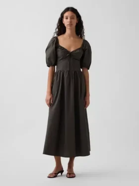 Vestido largo tipo corsé con mangas abullonadas