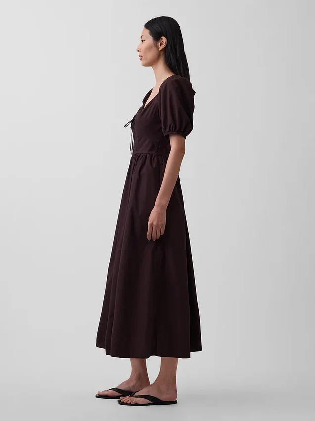 Vestido largo tipo corsé con mangas abullonadas