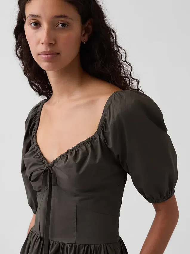 Vestido largo tipo corsé con mangas abullonadas