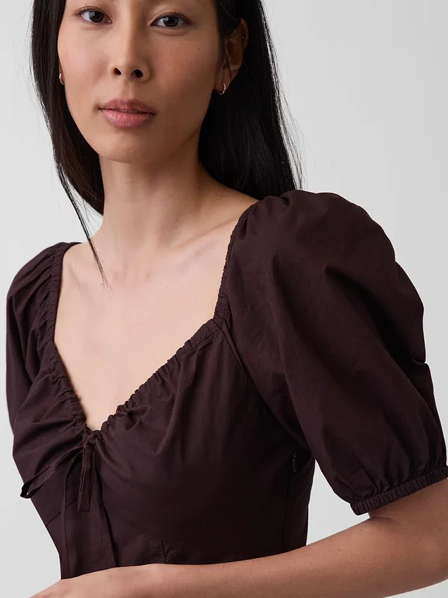 Vestido largo tipo corsé con mangas abullonadas