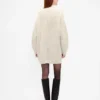 Vestido mini de jerséu oversize con cuello de tortuga