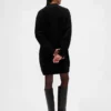 Vestido mini de jerséu oversize con cuello de tortuga