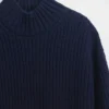 Vestido mini de jerséu oversize con cuello de tortuga
