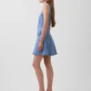Vestido mini de mezclilla con costuras y cremallera frontal